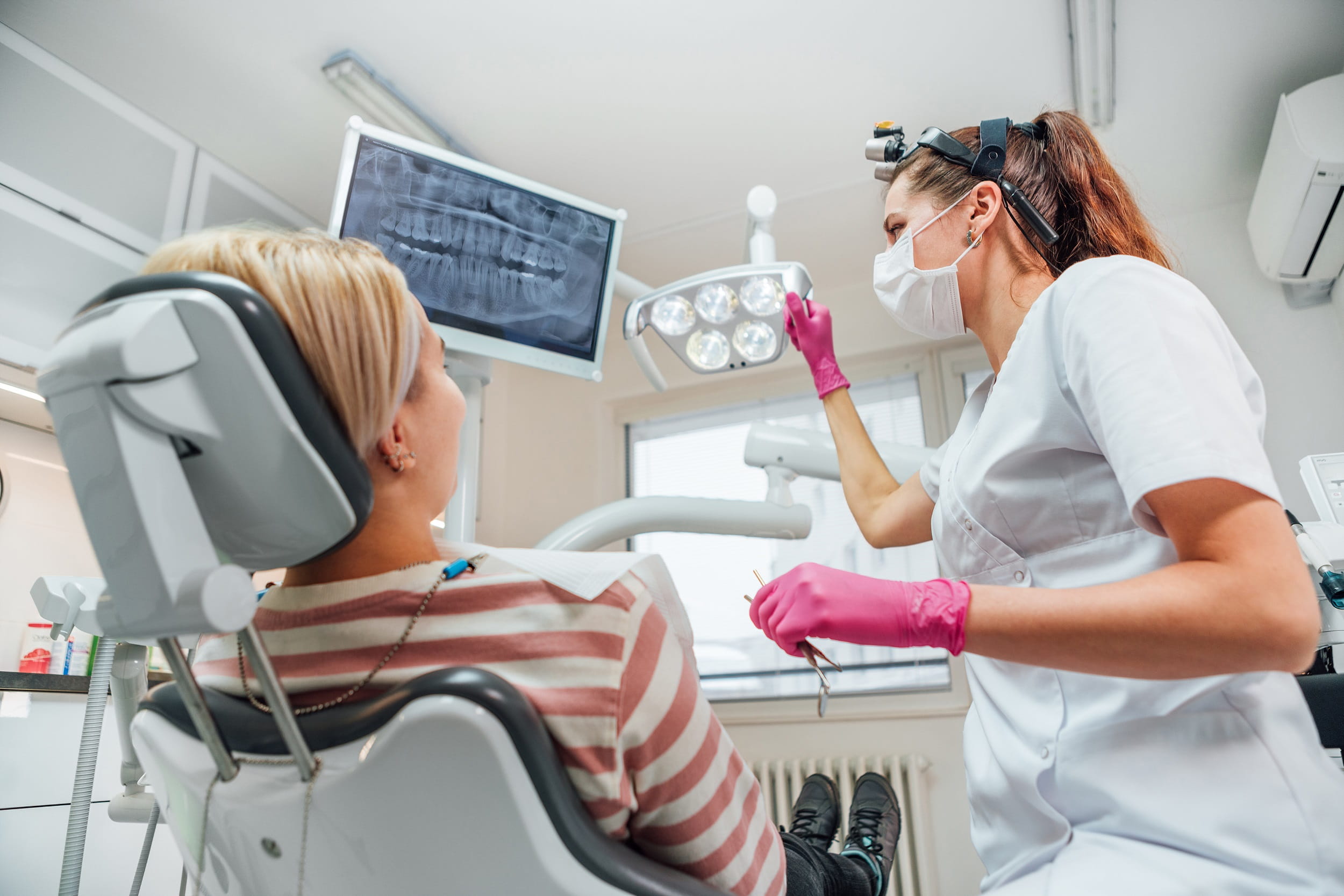 Patient receiving a dental X-ray at Sunrise Dental Clinic in Gig Harbor, WA for accurate diagnosis and healthy teeth